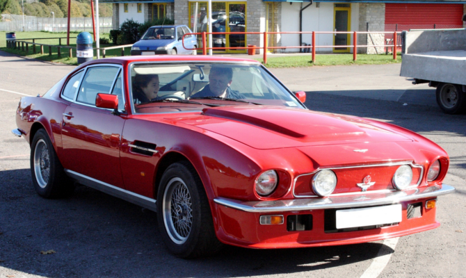 Eloise drives an Aston Martin